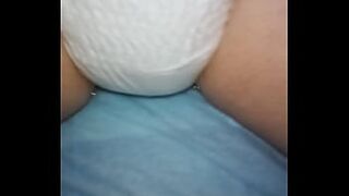 Playing with my wet soaked diaper LEAKYYYYY